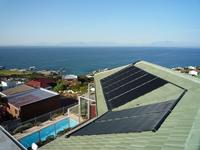AM Engineering Solar Pool Heating System - 7 Panels on Sloped Roof AM Engineering Solar Pool Heating System - 7 Panels on Sloped Roof